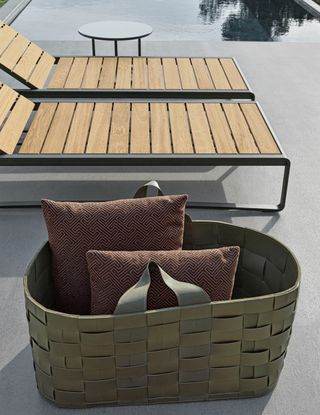 Sun loungers and basket outdoors