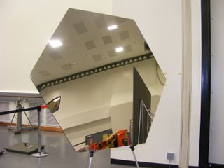 An example of one of the eighteen hexagonal mirrors that JWST will carry. The final mirrors will have a thin coat of gold to increase their reflectiveness.