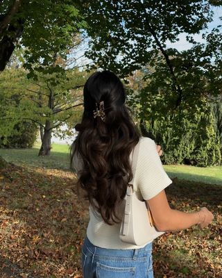 Woman with long, curled hair