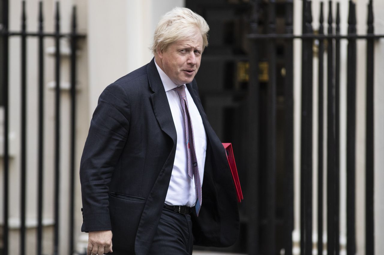 Boris Johnson arrives at Downing Street