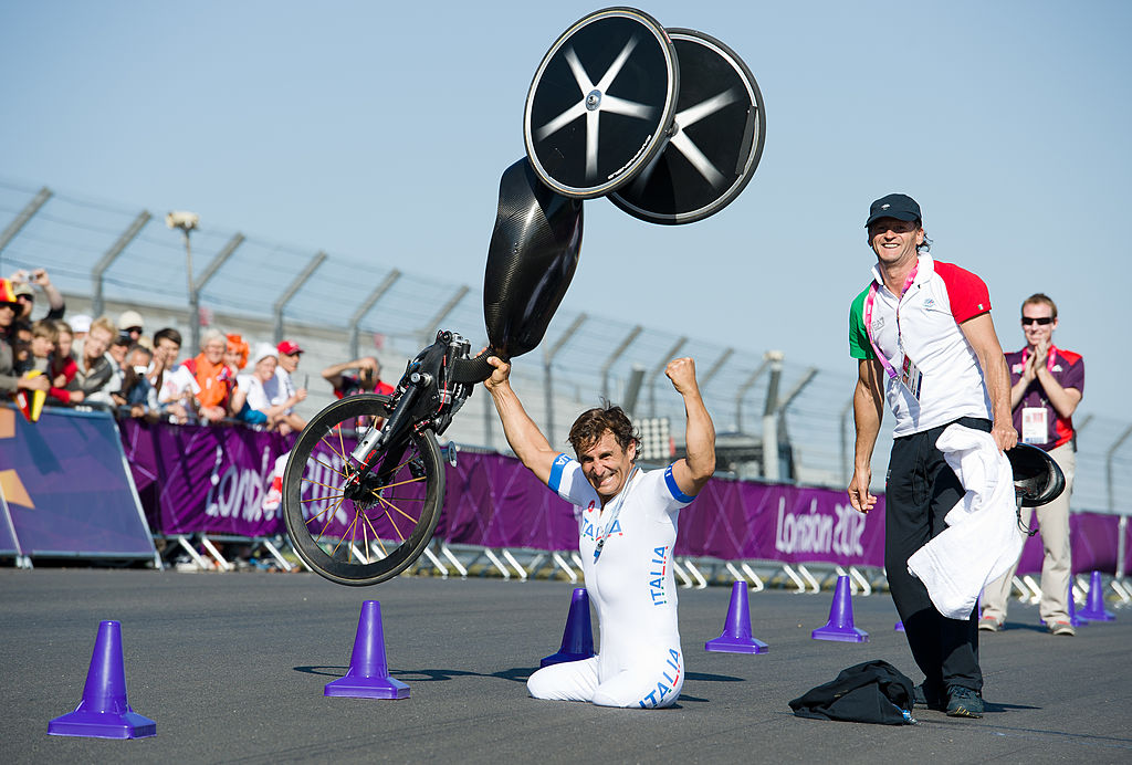 Italy&amp;apos;s Alessandro Zanardi celebrates after winning the gold medal in the men&amp;apos;s individual H4 time trial cycling final during the London 2012 Paralympic Games at Brands Hatch circuit, in Kent, southern England on September 5, 2012.  AFP PHOTO / LEON NEAL        (Photo credit should read LEON NEAL/AFP/GettyImages)