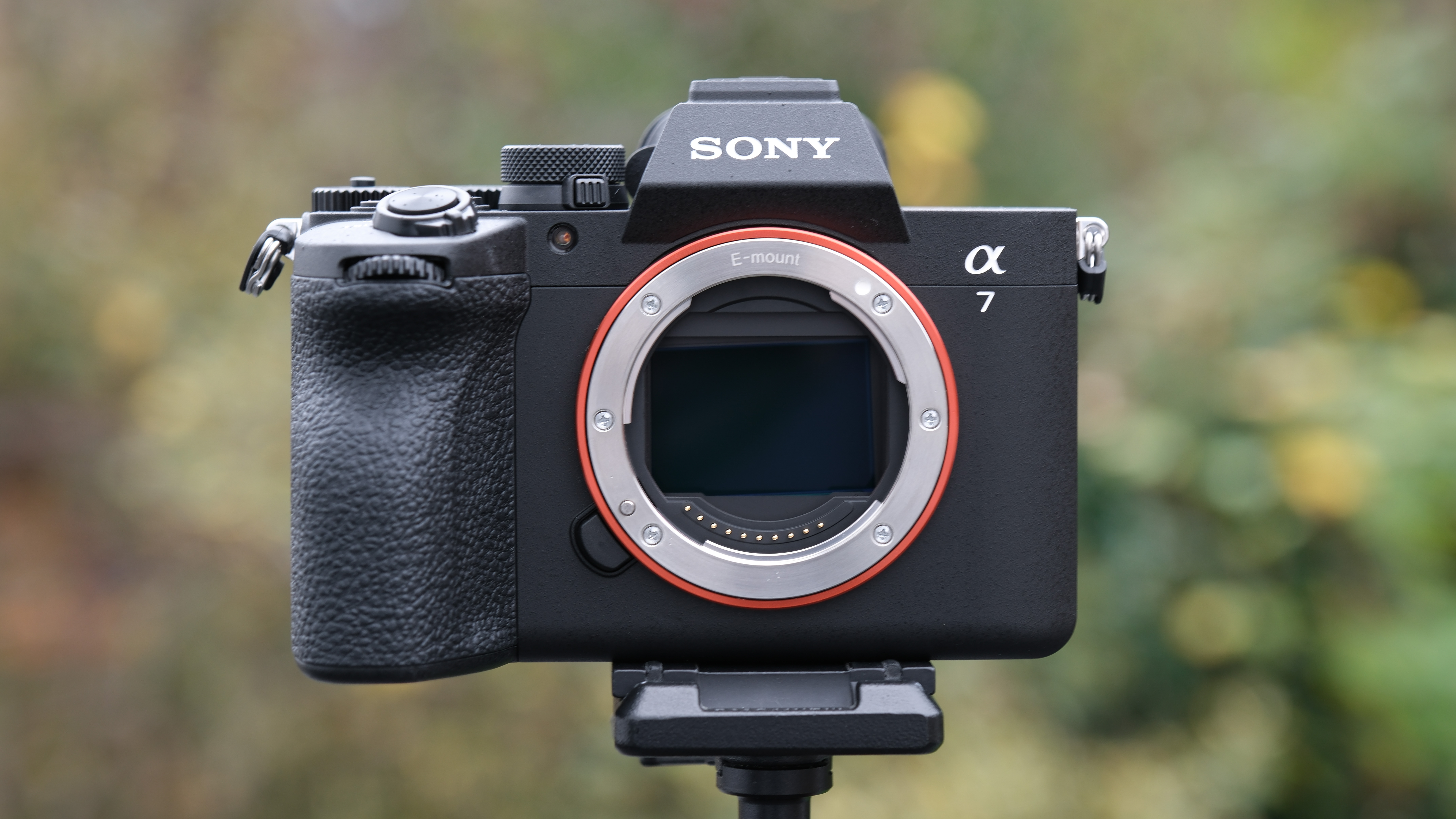 Sony A7 V camera from the front, on a tripod outside