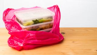 Plastic food containers in bag