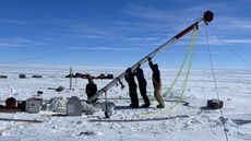 Researchers setting up a drill in the Allan Hills region of Antarctica.