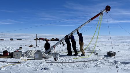 Researchers setting up a drill in the Allan Hills region of Antarctica.