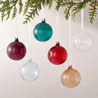 selection of multi-coloured glass Christmas tree baubles