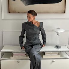 A photo of @rikkekrefting in a grey suit