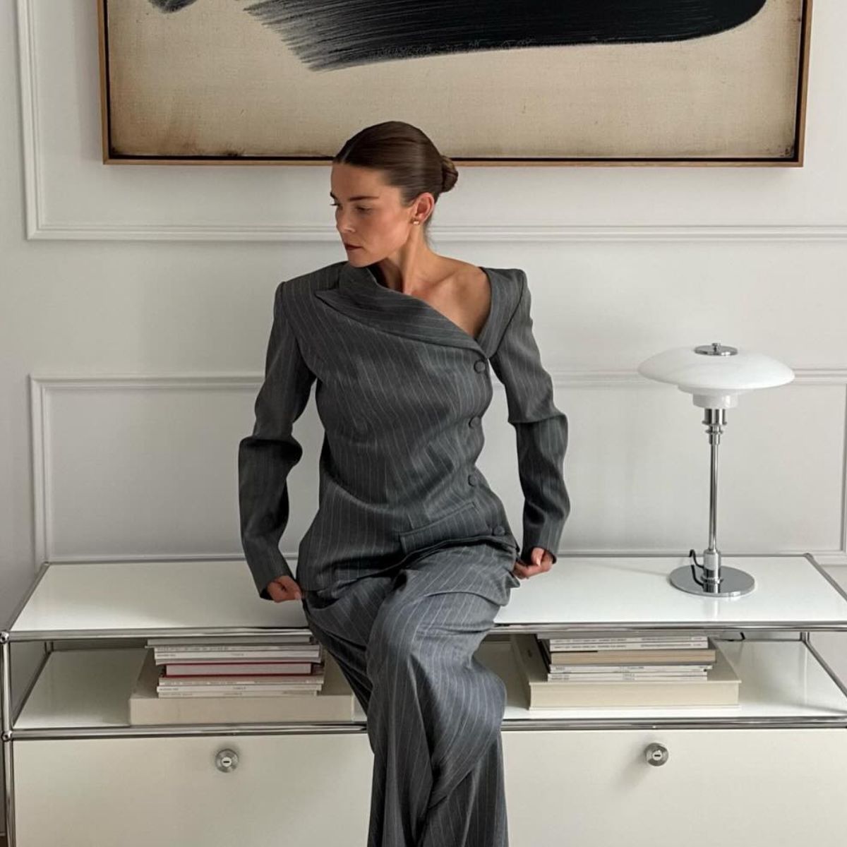 A photo of @rikkekrefting in a grey suit