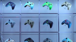 Wireless controllers for Xbox computer games sit on display on the Microsoft Corp. stand at the Gamescom gaming industry event in Cologne, Germany, on Tuesday, Aug. 21, 2018.
