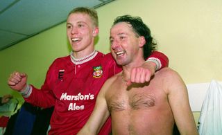 Wrexham goalscorers Steve Watkin and Mickey Thomas celebrate after their victory over Arsenal in the FA Cup, 1992