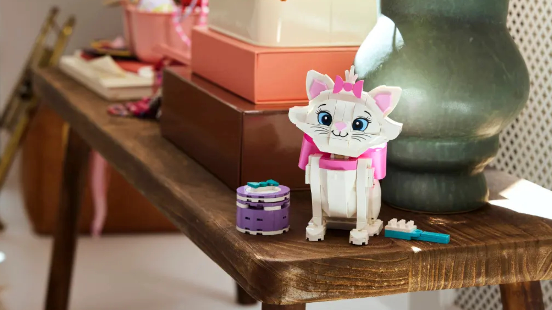 The Adorable Marie Lego set stood beside accessories on a wooden side table