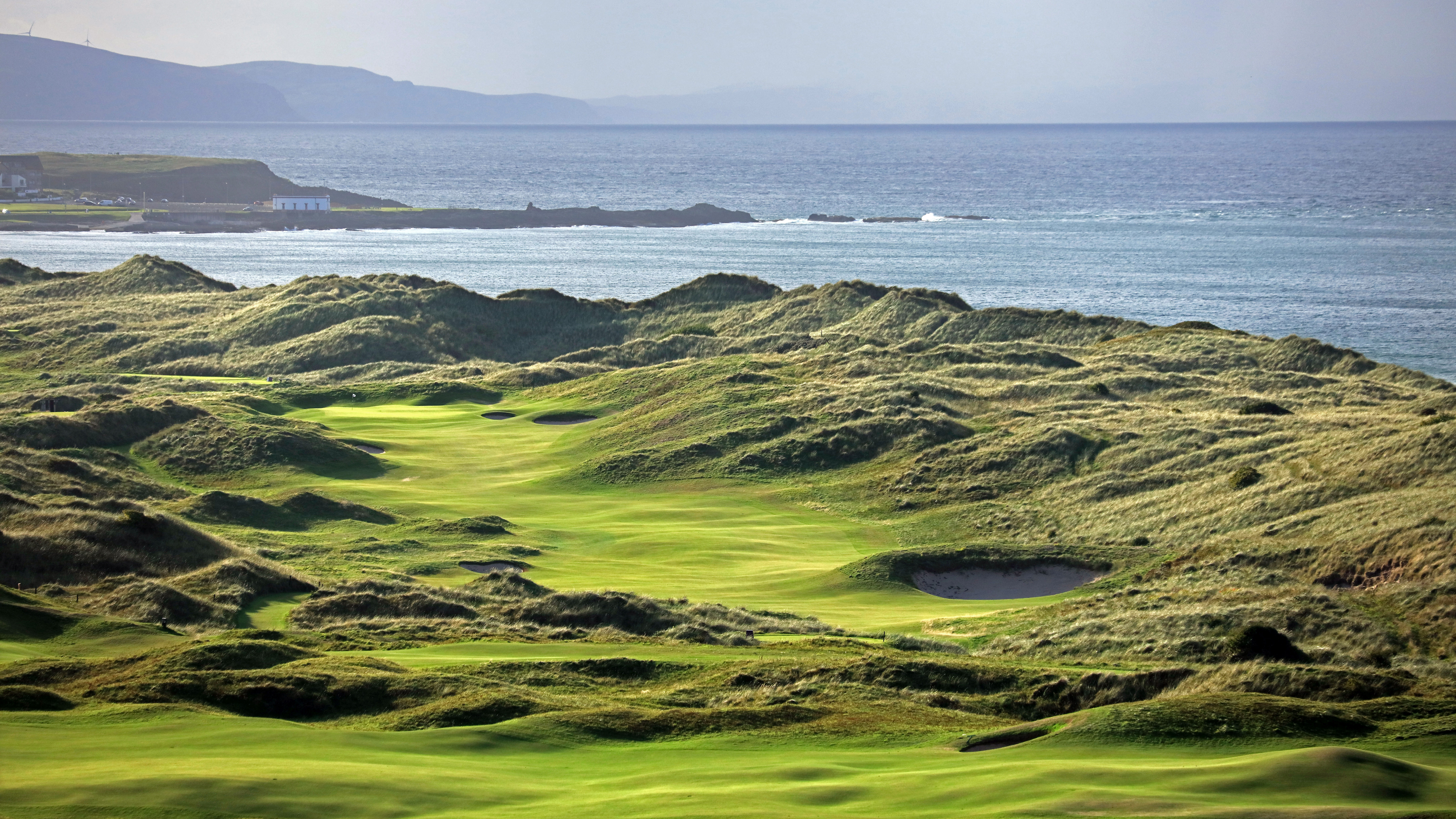 The seventh at Royal Portrush is a new hole that runs through the towering dunes. Image provided by Rob Smith, credit to Getty.