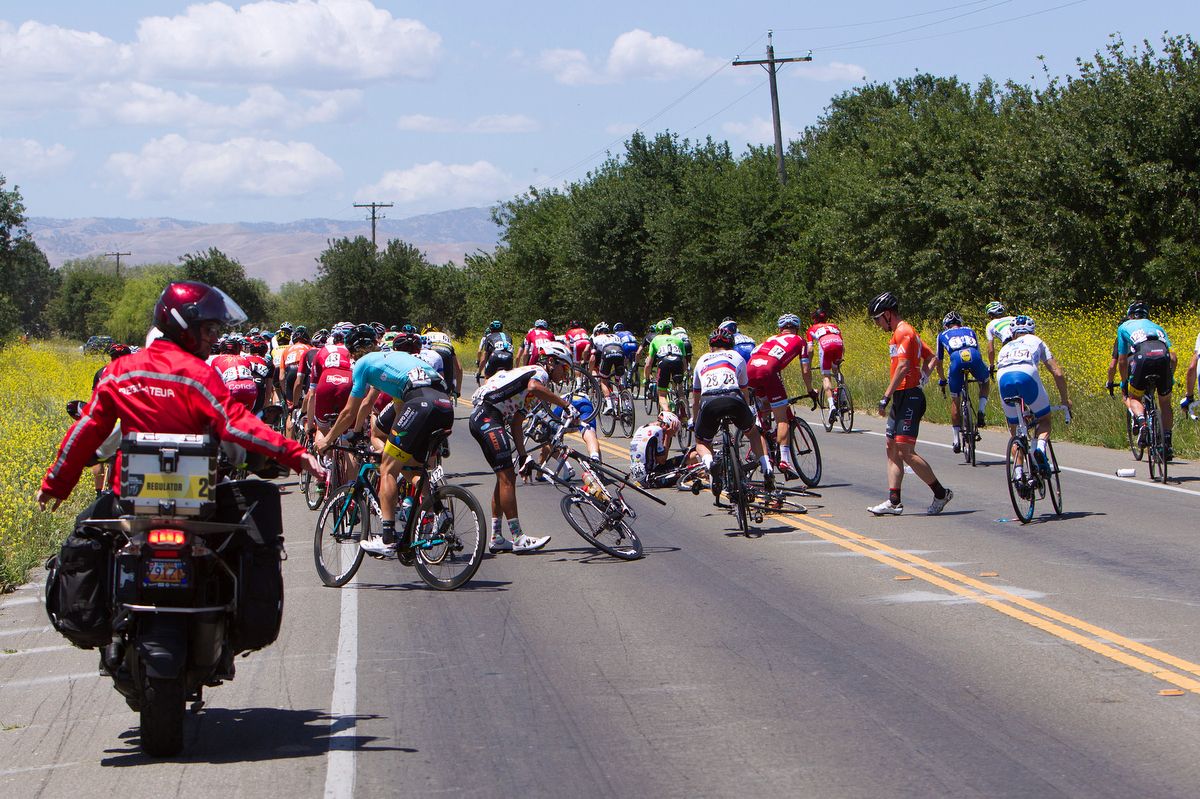 Riders pick themselves up after a crash
