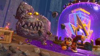 Donkey Kong punches a rock enemy in the face in Donkey Kong Bananza with a large purple glowing area in the background