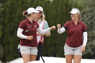 Ally Ewing and Jennifer Kupcho fist bump