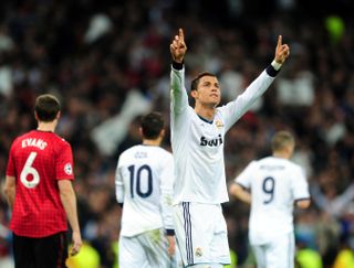 Ronaldo celebrates scoring against Manchester United in the Champions League