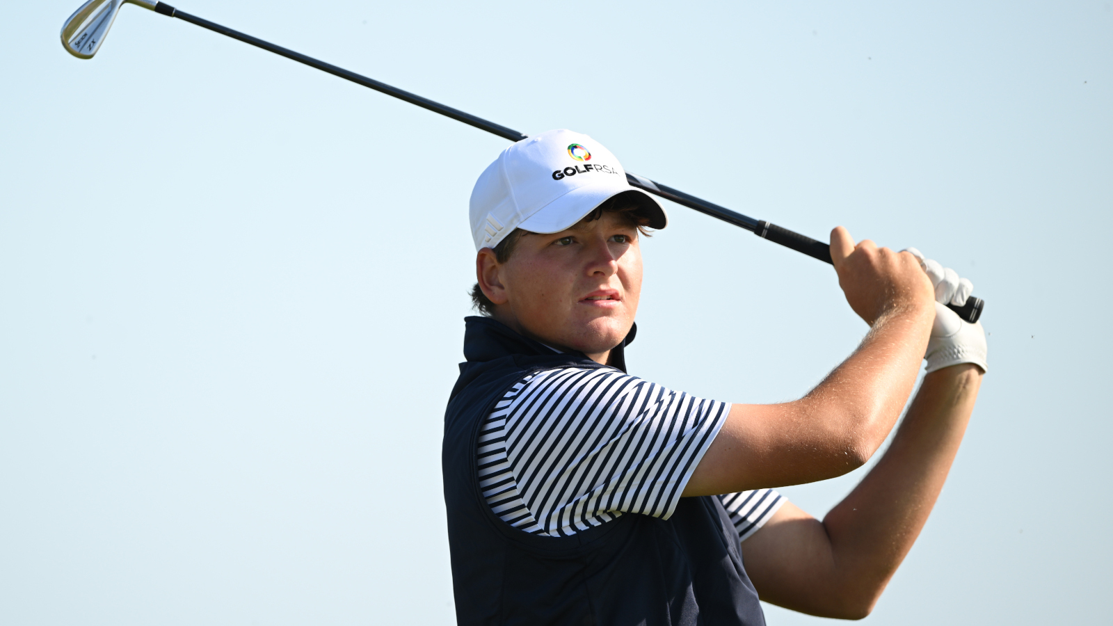 Daniel Bennett hits a shot at The Amateur Championship.