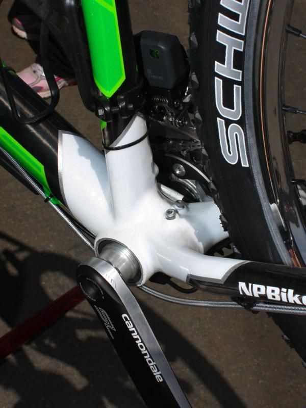 With no conventional derailleur cables to run, both of the front derailleur guides go unused down by the bottom bracket.