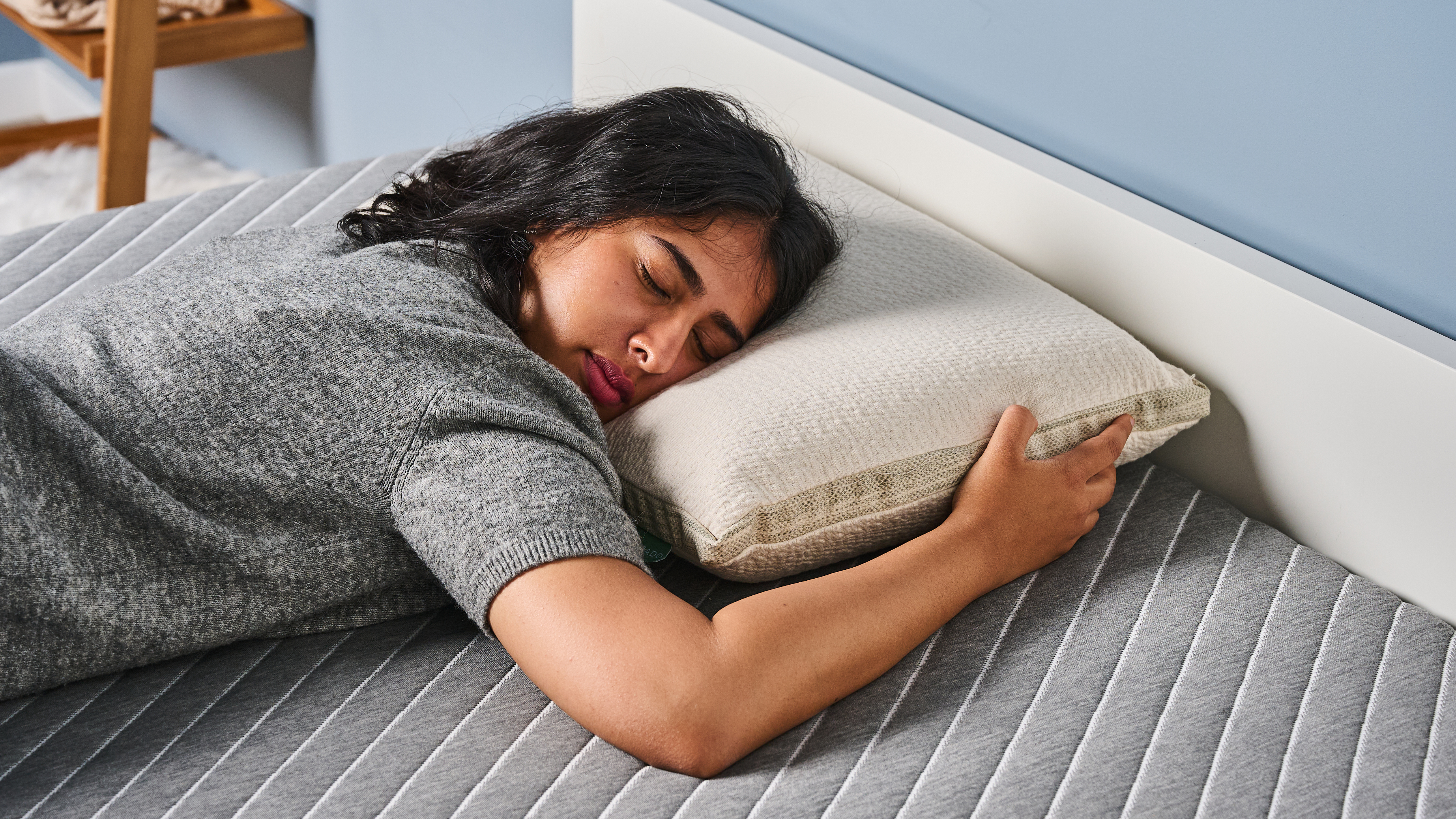 TG bedding writer sleeping on the Avocado Molded Latex Pillow in TG Sleep Studio