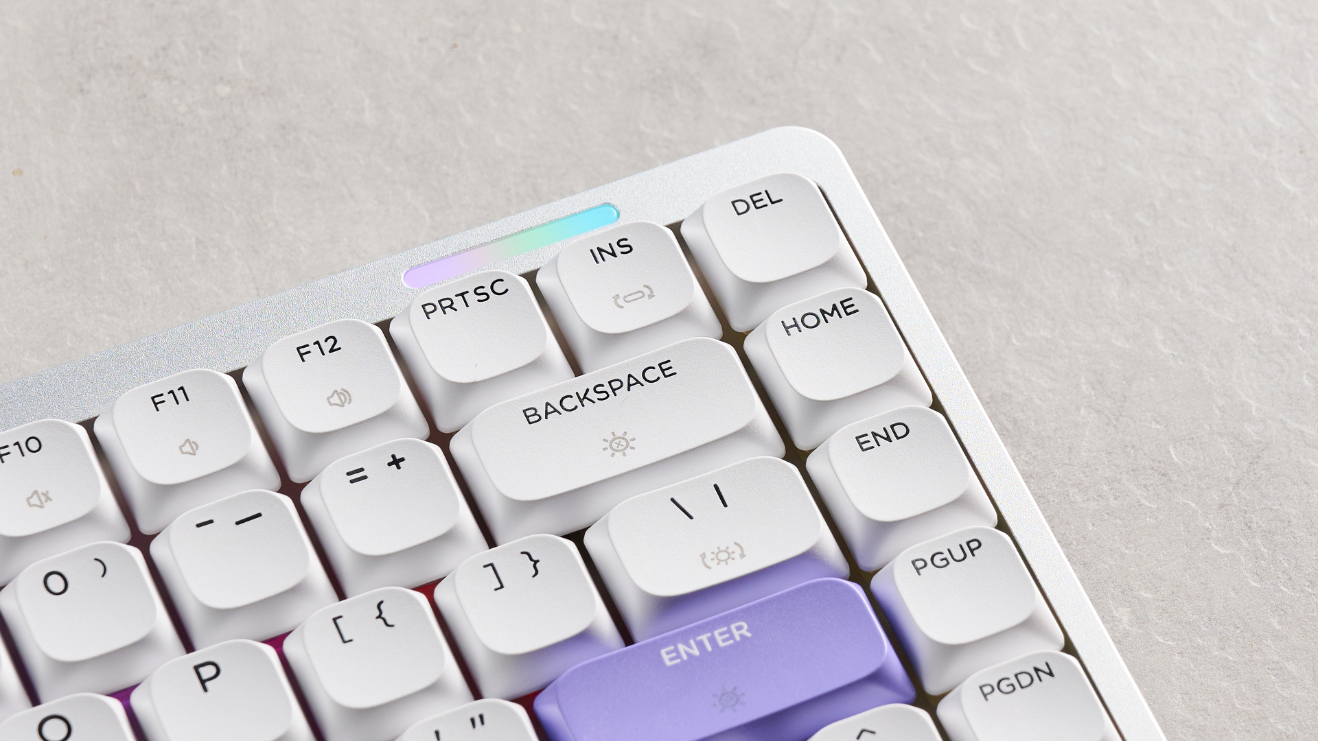 A white and purple Epomaker Luma84 low-profile mechanical keyboard