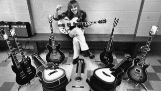 Rush's Alex Lifeson – pictured backstage with his guitar collection