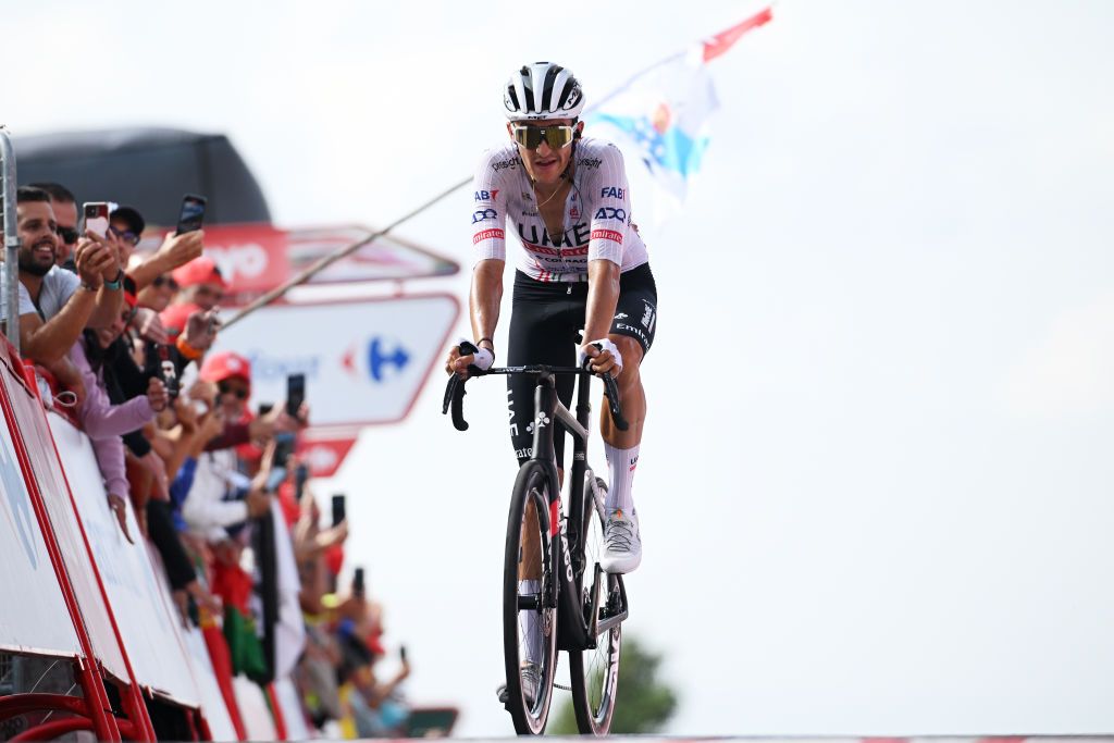 ESTACION DE MONTANA DE MANZANEDA OURENSE SPAIN AUGUST 29 Marc Soler of Spain and UAE Team Emirates crosses the finish line as third place winner during the La Vuelta 79th Tour of Spain 2024 Day 12 a 1375km stage from Ourense Termal to Estacion de Montana de Manzaneda 1491m UCIWT on August 29 2024 in Estacion de Montana de Manzaneda Spain Photo by Dario BelingheriGetty Images