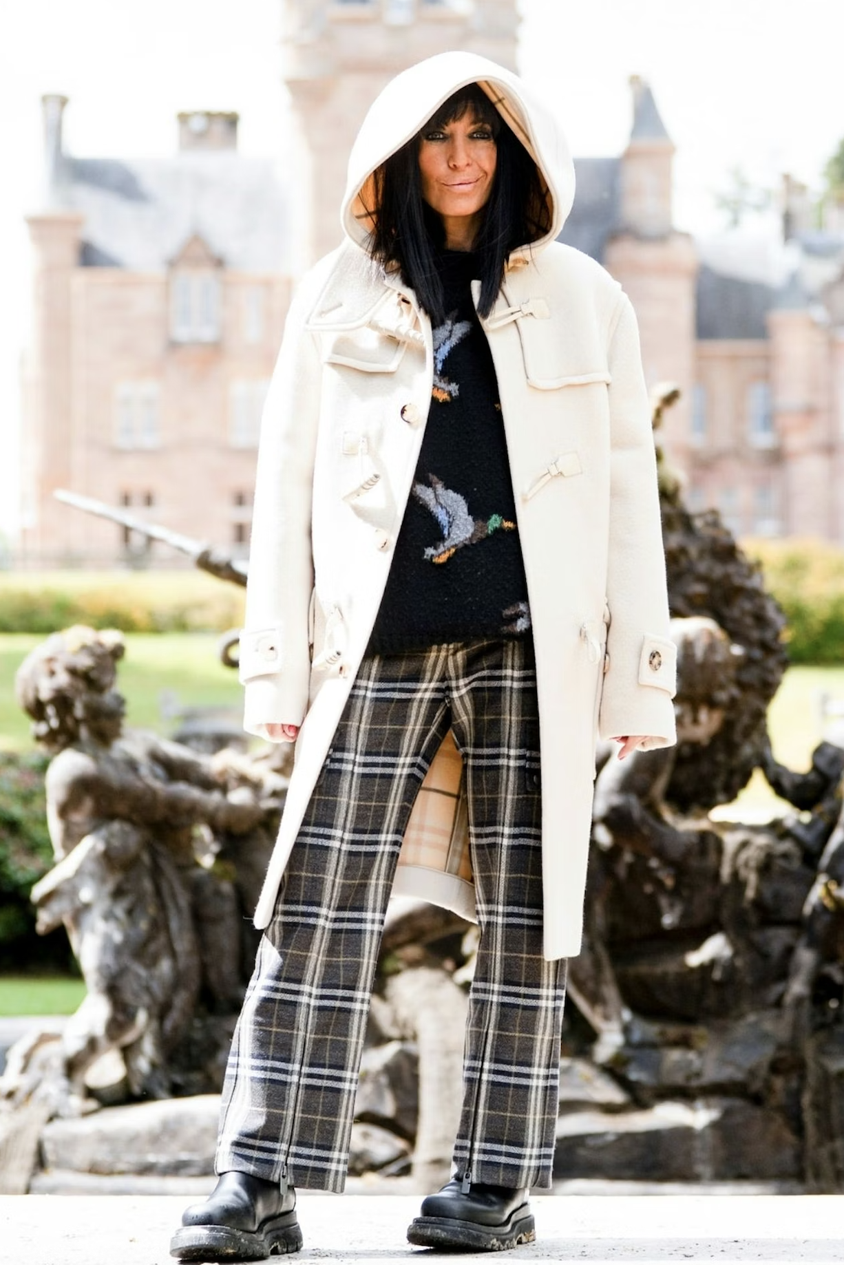 Claudia Winkleman wearing white duffle coat