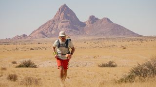 A runner in the desert during a Beyond the Ultimate race