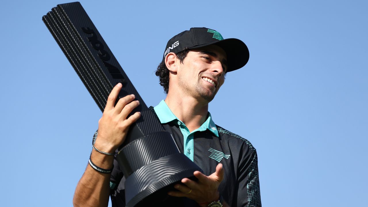 Joaquin Niemann of Torque GC poses for a photo with his trophy after winning the LIV Golf Invitational - Jeddah at Royal Greens Golf &amp; Country Club on March 03, 2024 in King Abdullah Economic City , Saudi Arabia