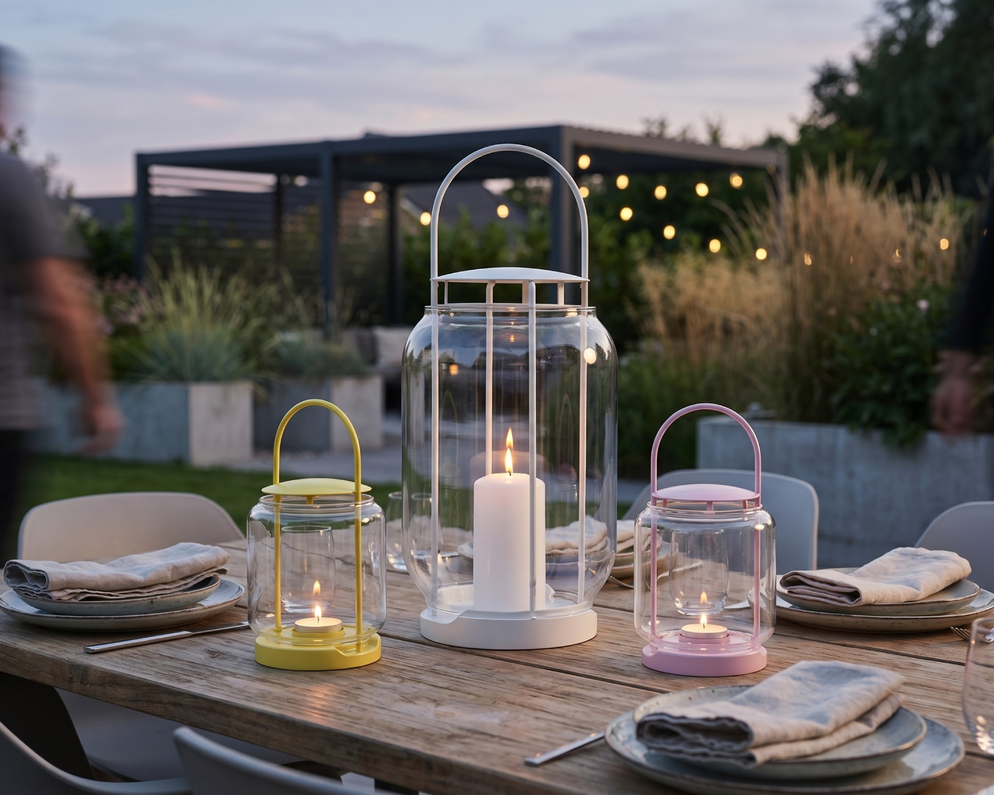 IKEA TOFSAND lanterns in a garden for outdoor dining