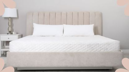 A picture of a stripped mattress with bedding on top to represent how to clean a mattress
