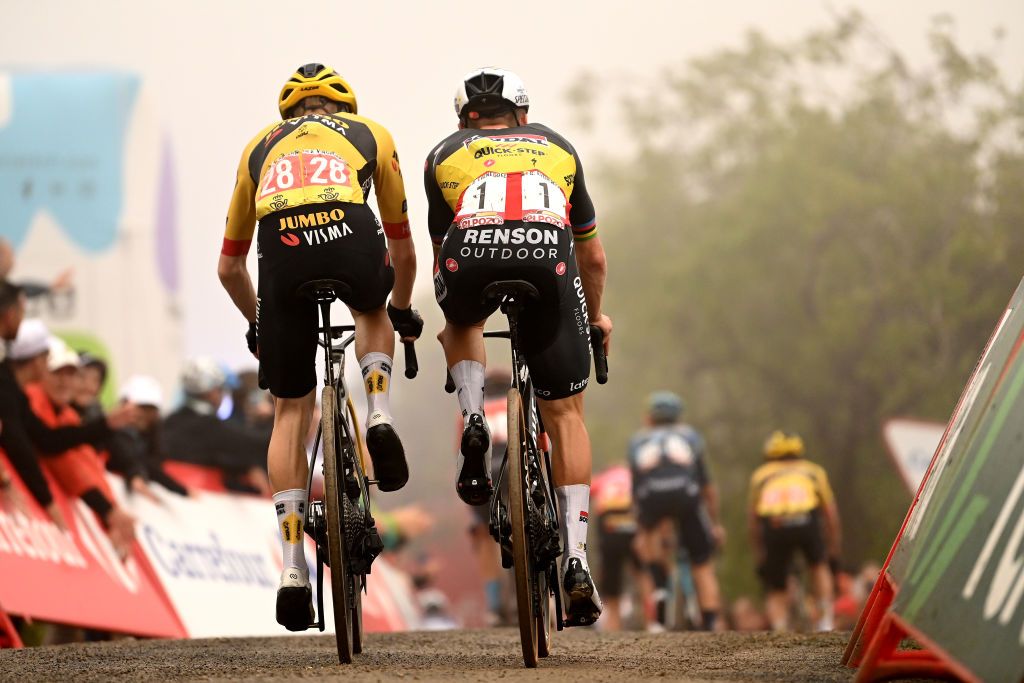 Jonas Vingegaard (Jumbo-Visma) and Remco Evenepoel (Soudal-Quick Step) cruise on the muddy road to the finish