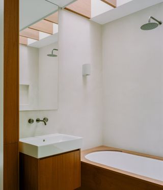 Bathroom at Artists' House, London by Mitchell + Corti Architects