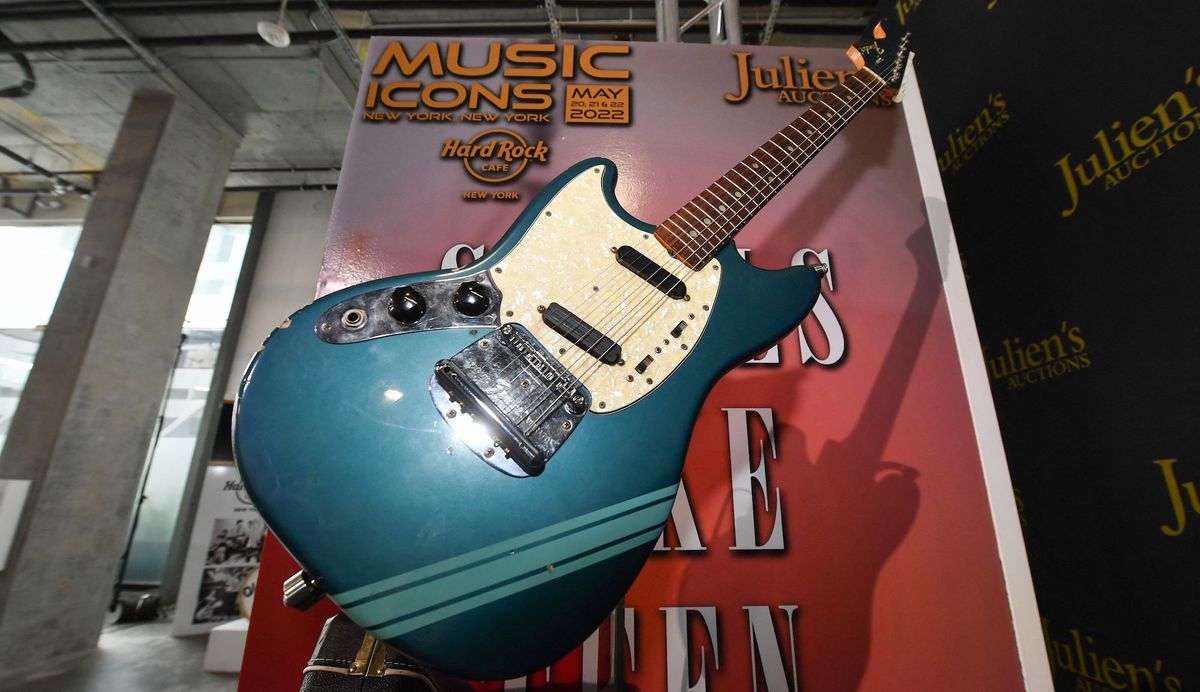 The blue 1969 Mustang Fender guitar used by Kurt Cobain in the 1991 Nirvana music video &quot;Smells Like Teen Spirit&quot; is displayed at the media preview of the &quot;Music Icons&quot; auction, at Julien&#039;s Auctions in Beverly Hills, California, on April 11, 2022