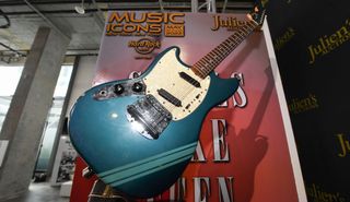 The blue 1969 Mustang Fender guitar used by Kurt Cobain in the 1991 Nirvana music video "Smells Like Teen Spirit" is displayed at the media preview of the "Music Icons" auction, at Julien's Auctions in Beverly Hills, California, on April 11, 2022