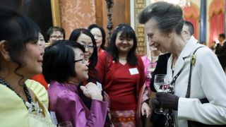 Anne, Princess Royal speaks with representatives from British East and South-East Asian communities during a reception