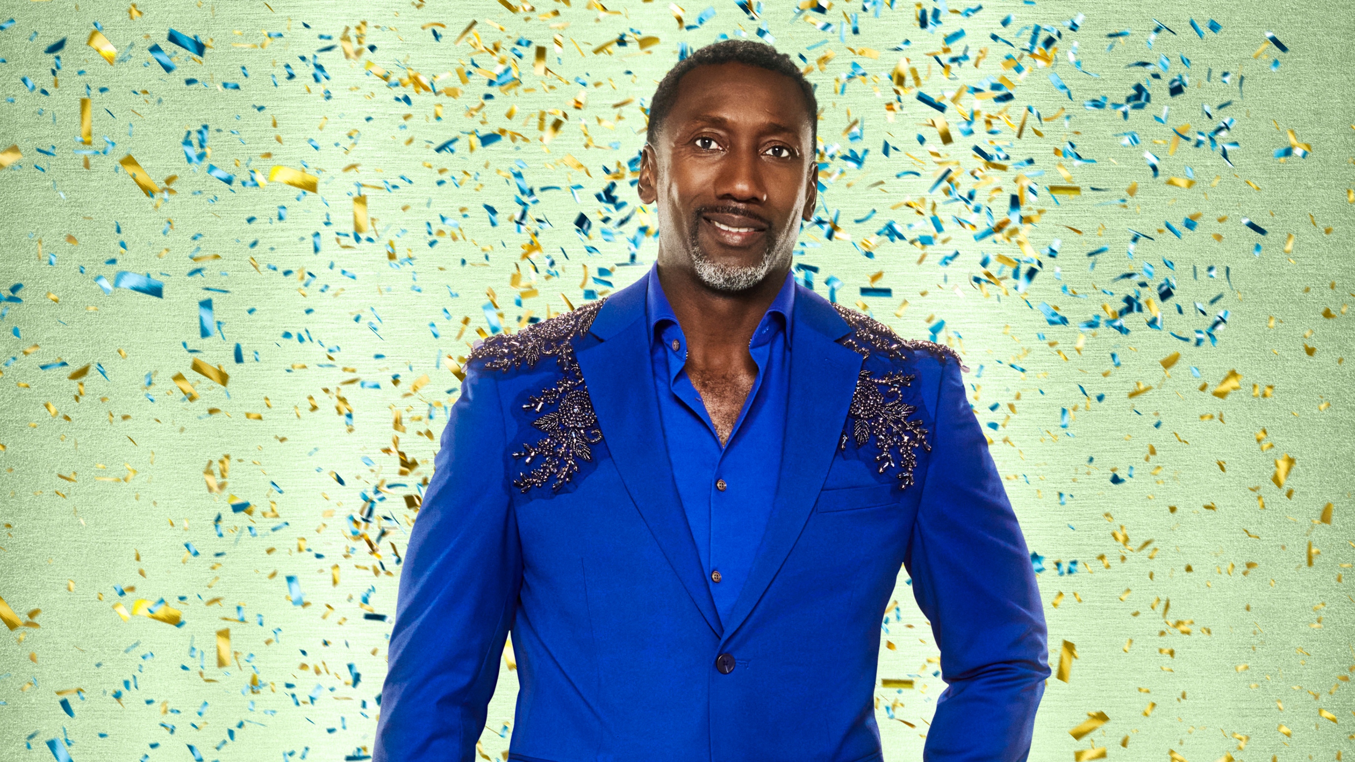 Strictly Come Dancing 2025 - Jimmy Floyd Hasselbaink in a blue suit with confetti falling around him.