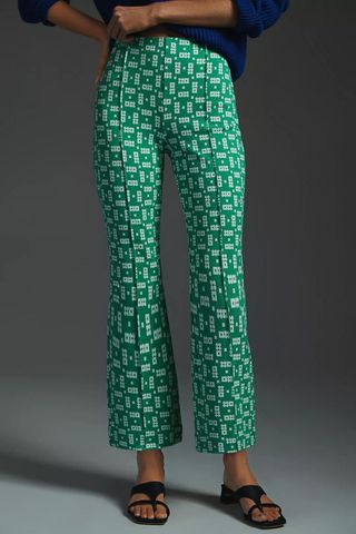 green and white flared patterned pants