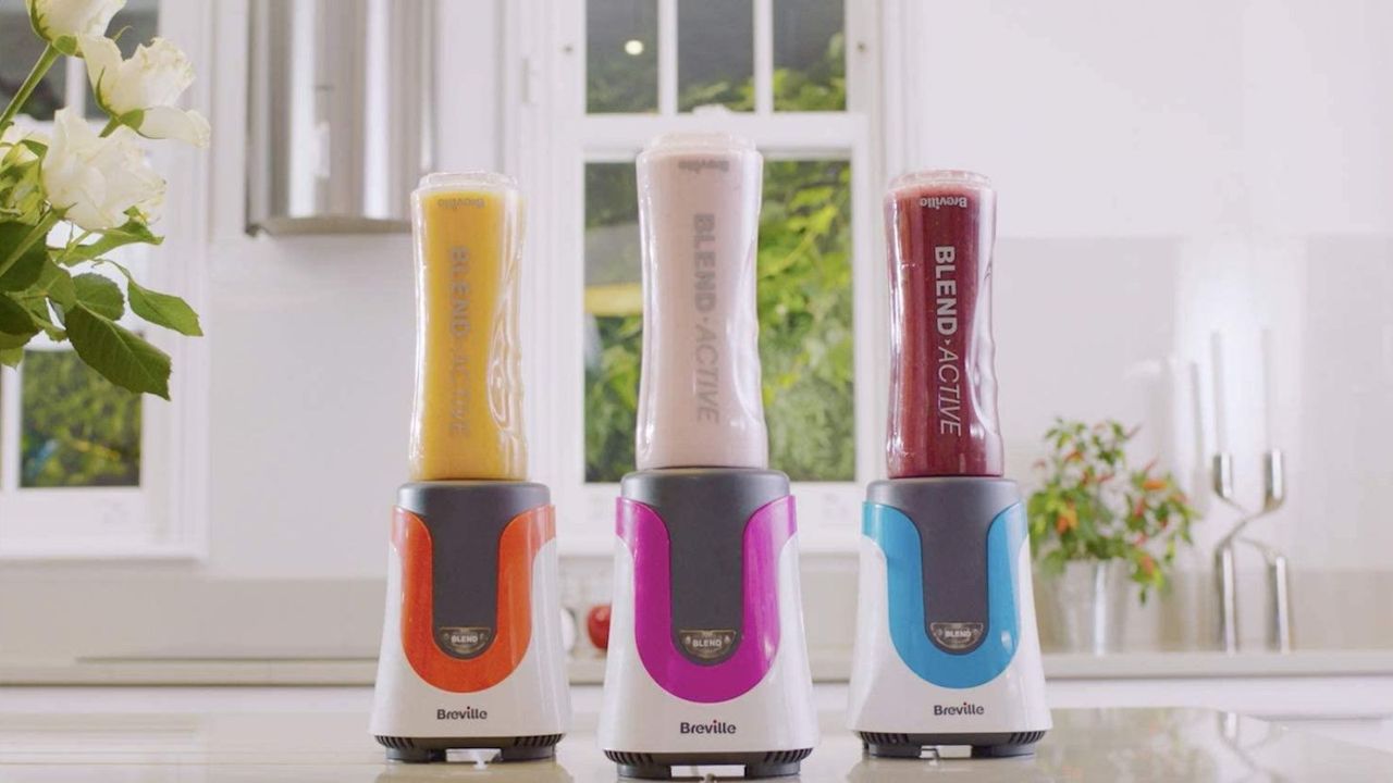 Three portable Breville blenders on a kitchen counter, demonstrating how to get the most out of a blender