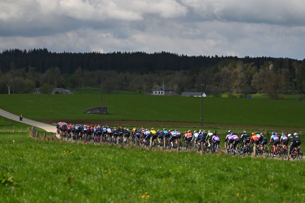 LIEGE BELGIUM APRIL 24 A general view of the peloton passing through a landscape during the 8th Liege Bastogne Liege Femmes 2024 a 1529km one day race from Bastogne to Liege UCIWWT on April 24 2024 in Liege Belgium Photo by Luc ClaessenGetty Images