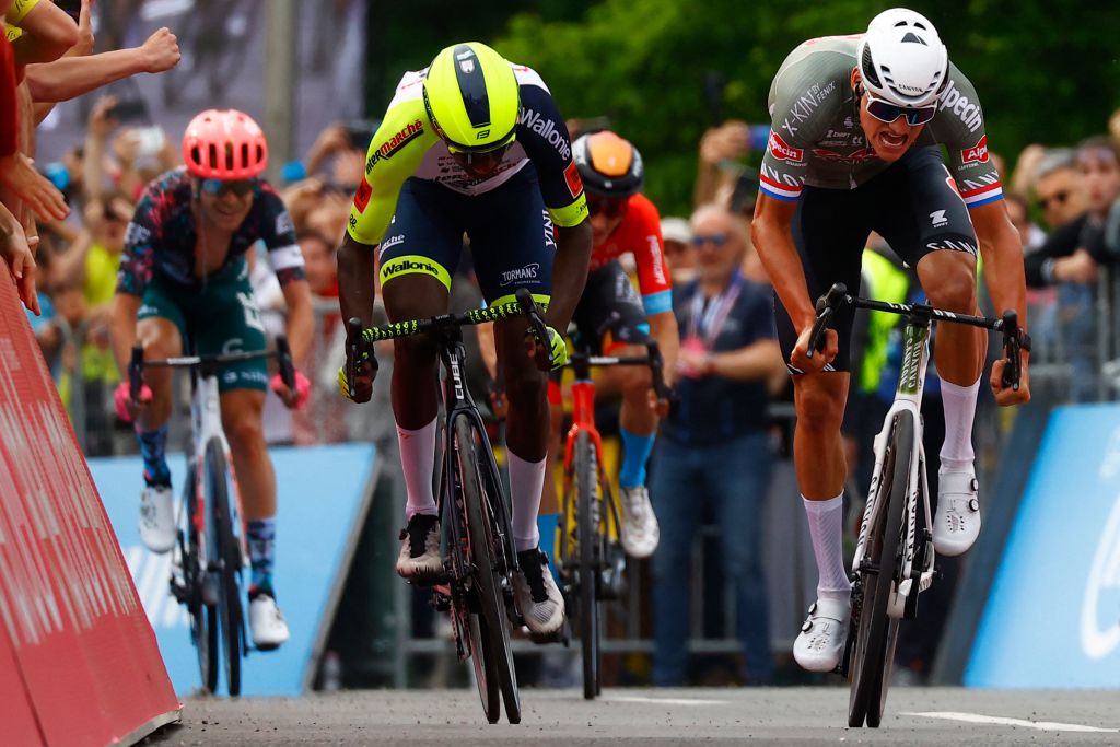 Team AlpecinFenix Dutch rider Mathieu van der Poel R sprints on his way to win ahead of Team Wantys Eritrean rider Biniam Girmay Hailu L the first stage of the Giro dItalia 2022 cycling race 195 kilometers between Budapest and Visegrad Hungary on May 6 2022 Photo by Luca Bettini AFP Photo by LUCA BETTINIAFP via Getty Images