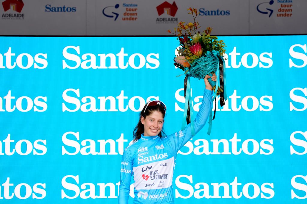 WILLIAMSTOWN AUSTRALIA JANUARY 23 Ruby RosemanGannon of Australia and Team BikeExchangeJayco celebrates winning the Blue Santos Leaders Jersey on the podium ceremony after the 2nd Santos Festival Of Cycling 2022 Womens Elite Stage 1 a 854km stage from Tanunda to Williamstown TourDownUnder on January 23 2022 in Williamstown Australia Photo by Daniel KaliszGetty Images