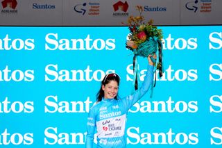 WILLIAMSTOWN AUSTRALIA JANUARY 23 Ruby RosemanGannon of Australia and Team BikeExchangeJayco celebrates winning the Blue Santos Leaders Jersey on the podium ceremony after the 2nd Santos Festival Of Cycling 2022 Womens Elite Stage 1 a 854km stage from Tanunda to Williamstown TourDownUnder on January 23 2022 in Williamstown Australia Photo by Daniel KaliszGetty Images