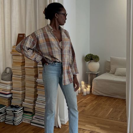 An image of a woman wearing new fall denim outfit idea 2026