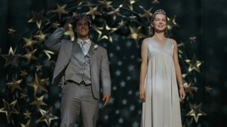 Carrie on stage as prom queen in Carrie