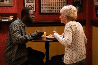 Jean Slater talking to Kojo Asare in the Queen Vic