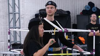 Jack Quaid wearing a cube-shaped mocap rig for God of War Laufey.