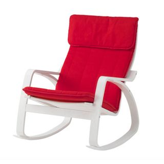 white chair with red cushions