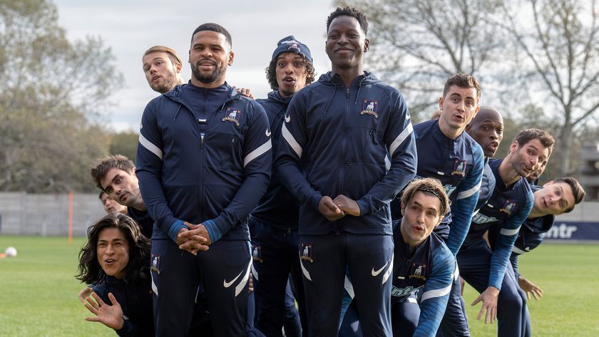 (L to R) Cristo Fernández as Dani Rojas, Stephen Manas as Richard Montlaur, David Elsendoorn as Jan Maas, Kola Bokinni as Isaac McAdoo, Moe Hashim as Bumbercatch, Toheeb Jimoh as Sam Obisanya, Phil Dunster as Jamie Tartt, Billy Harris as Colin Hughes and Moe Jeudy-Lamour as Thierry Zoreaux singing in formation in Ted Lasso season 3 episode 12, &quot;So Long, Farewell&quot;