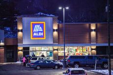 The exterior of an Aldi store at night in Athens, Ohio